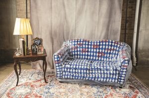 Plastic-Covered Couch Turned Work of Art To Protect Black Culture Lands In Brooklyn This Weekend